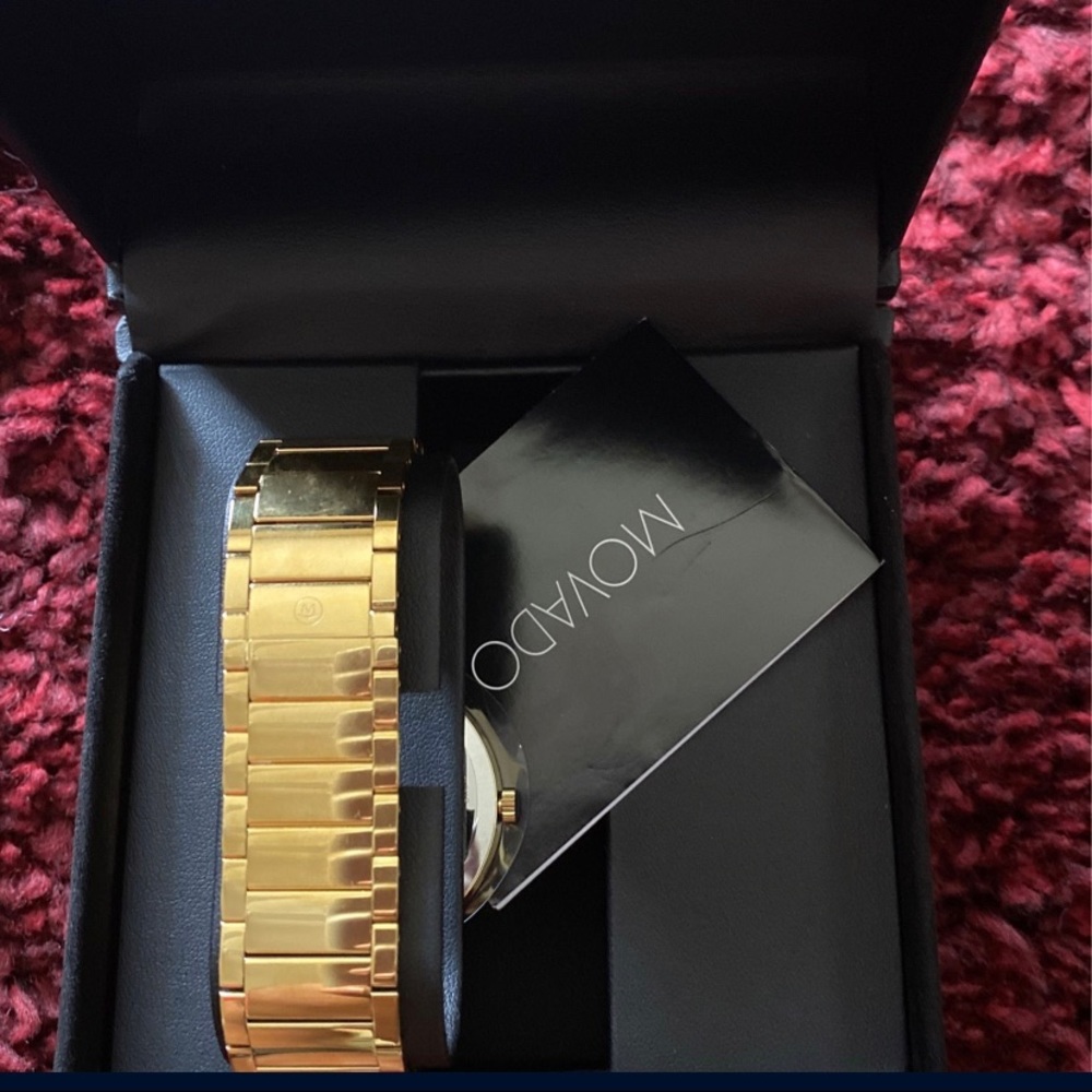 Movado bold, never worn original packaging. Men’s watch